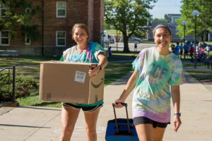Student moving into residence hall